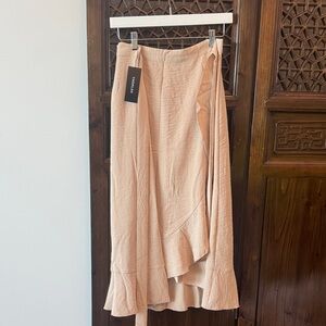Elegant Cream Midi Skirt by VNDFLAG